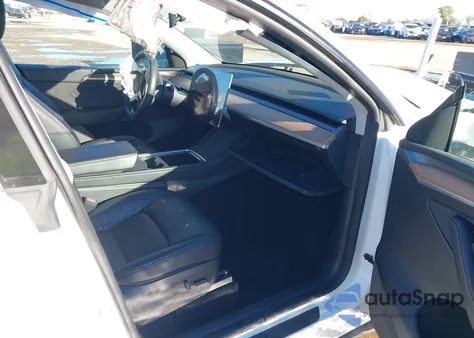 2023 Tesla Model Y Rwd from USA, damaged, VIN 7SAYGDED9PF942211